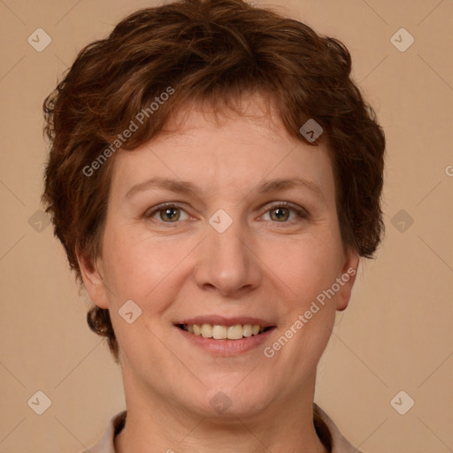 Joyful white adult female with short  brown hair and brown eyes