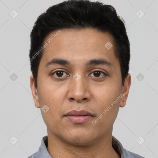 Neutral latino young-adult male with short  black hair and brown eyes