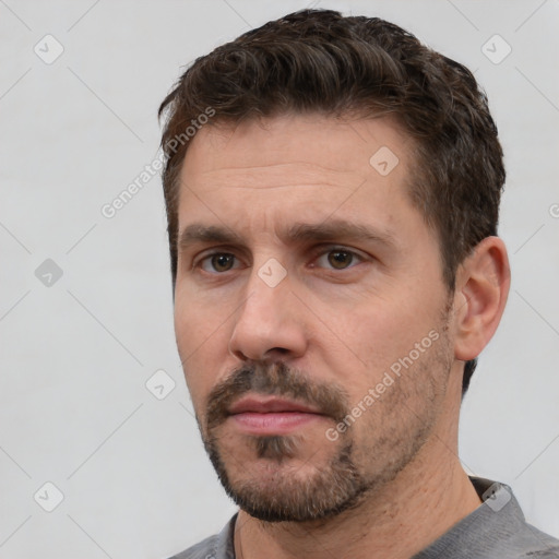 Neutral white adult male with short  brown hair and brown eyes