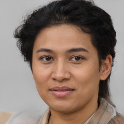 Joyful asian young-adult female with short  brown hair and brown eyes