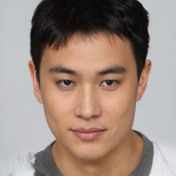 Neutral asian young-adult male with short  brown hair and brown eyes