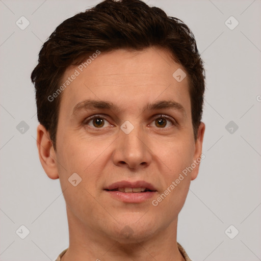 Joyful white adult male with short  brown hair and brown eyes