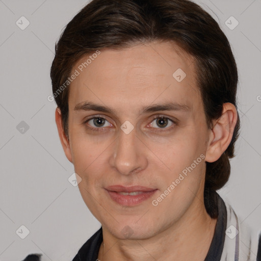 Joyful white adult female with medium  brown hair and brown eyes