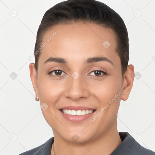 Joyful white young-adult female with short  brown hair and brown eyes