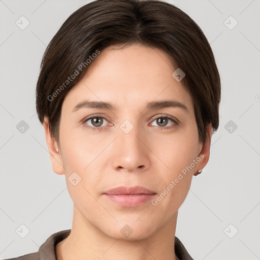 Neutral white young-adult female with short  brown hair and brown eyes