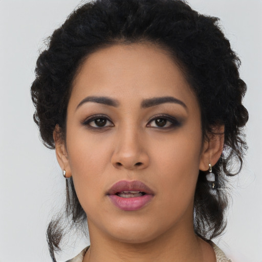 Neutral latino young-adult female with long  black hair and brown eyes