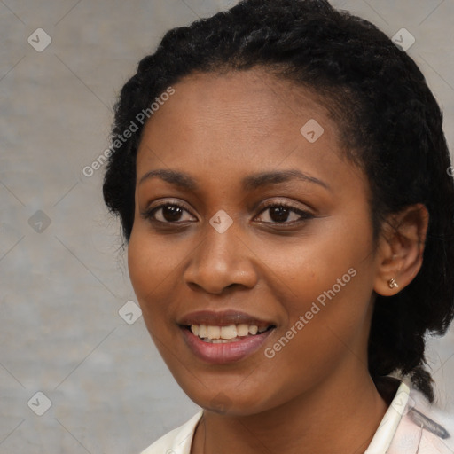 Joyful black young-adult female with medium  black hair and brown eyes