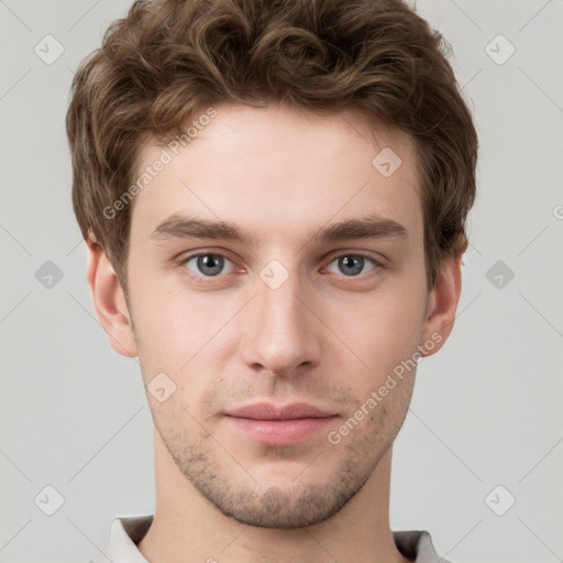 Neutral white young-adult male with short  brown hair and grey eyes