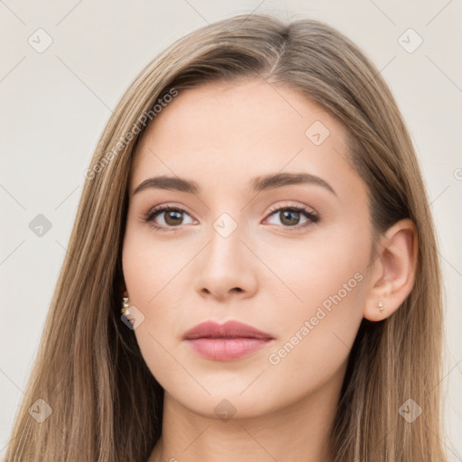 Neutral white young-adult female with long  brown hair and brown eyes