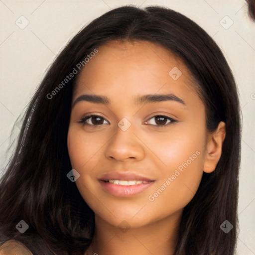 Joyful latino young-adult female with long  black hair and brown eyes