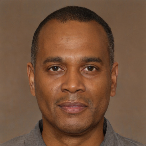Neutral latino young-adult male with short  brown hair and brown eyes
