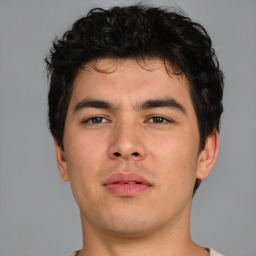 Neutral asian young-adult male with short  brown hair and brown eyes