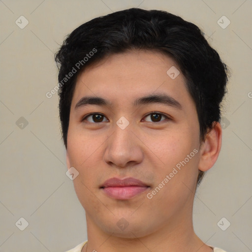 Joyful asian young-adult male with short  brown hair and brown eyes