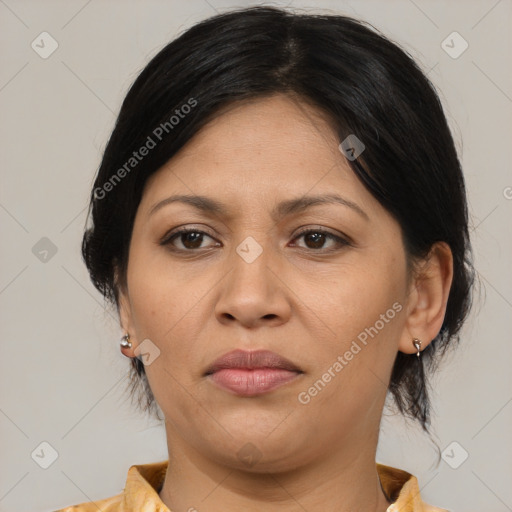 Joyful asian adult female with medium  brown hair and brown eyes