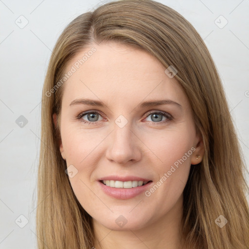 Joyful white young-adult female with long  brown hair and grey eyes