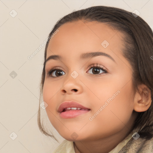 Joyful white child female with medium  brown hair and brown eyes