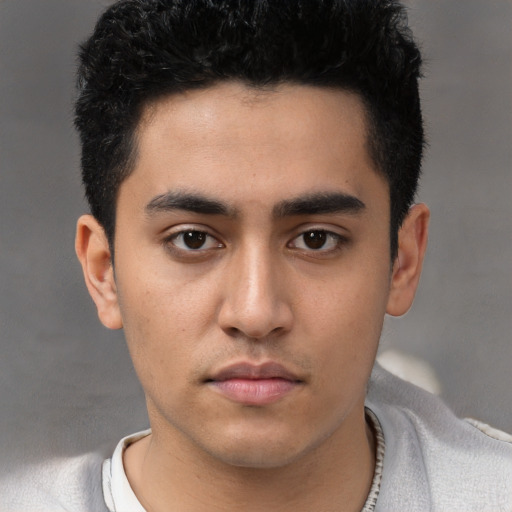 Neutral white young-adult male with short  black hair and brown eyes