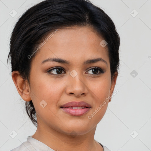 Joyful latino young-adult female with short  brown hair and brown eyes