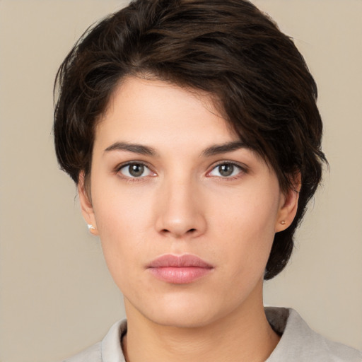 Neutral white young-adult female with medium  brown hair and brown eyes