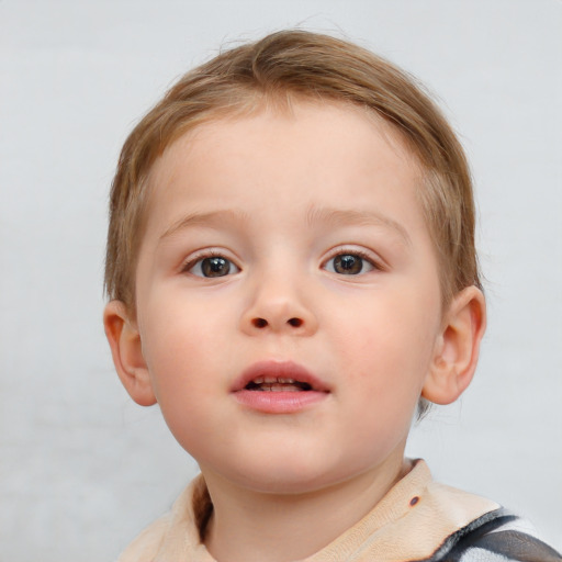 Neutral white child male with short  brown hair and blue eyes