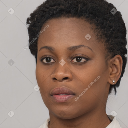 Neutral black young-adult female with short  brown hair and brown eyes