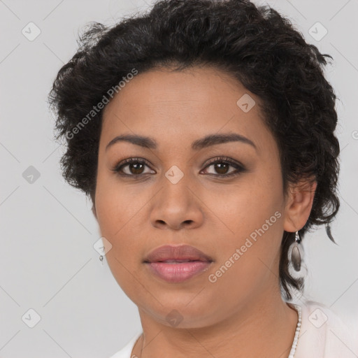 Joyful latino young-adult female with short  brown hair and brown eyes