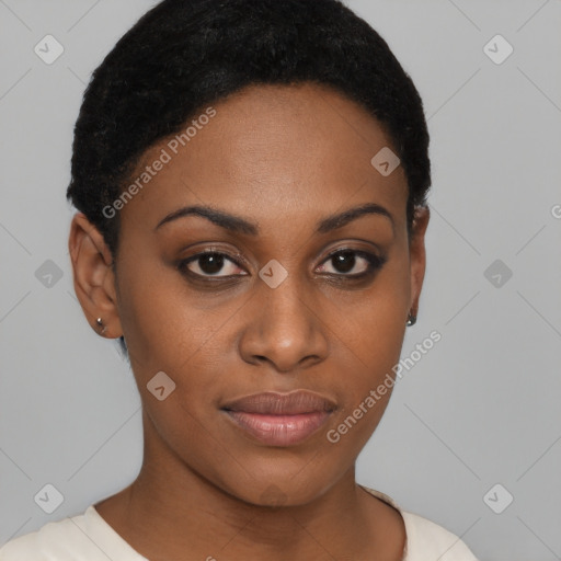 Joyful black young-adult female with short  black hair and brown eyes