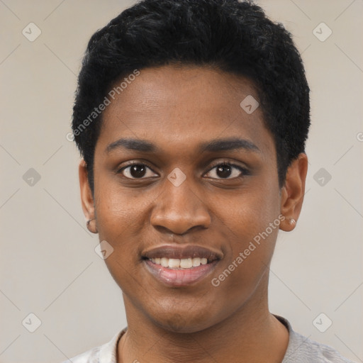 Joyful black young-adult male with short  black hair and brown eyes