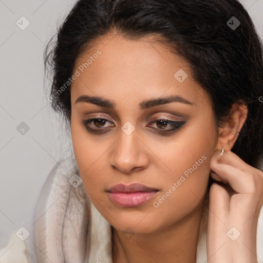 Joyful latino young-adult female with long  brown hair and brown eyes