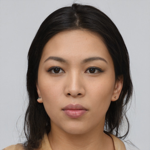 Neutral asian young-adult female with medium  black hair and brown eyes