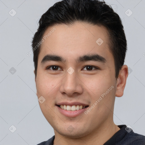 Joyful white young-adult male with short  black hair and brown eyes