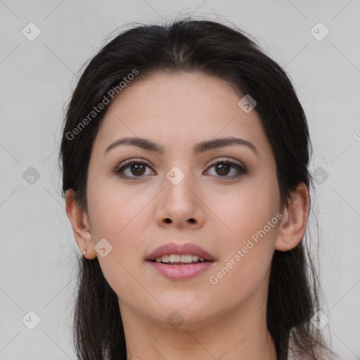 Joyful asian young-adult female with long  brown hair and brown eyes