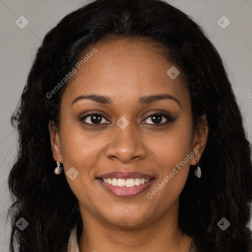 Joyful black young-adult female with long  brown hair and brown eyes