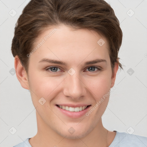 Joyful white young-adult female with short  brown hair and grey eyes