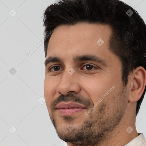 Joyful white adult male with short  black hair and brown eyes