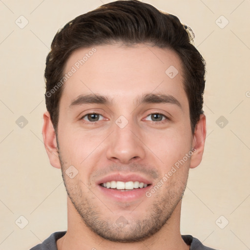 Joyful white young-adult male with short  brown hair and brown eyes