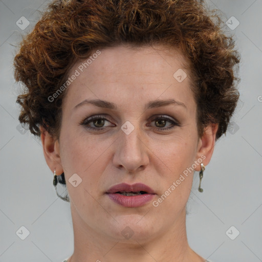 Joyful white adult female with short  brown hair and brown eyes