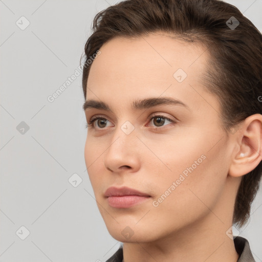 Neutral white young-adult female with short  brown hair and brown eyes