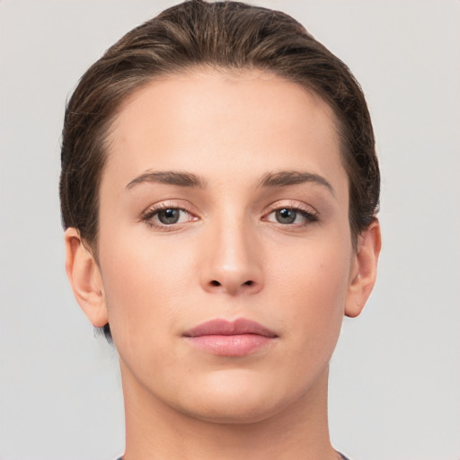 Neutral white young-adult female with short  brown hair and brown eyes