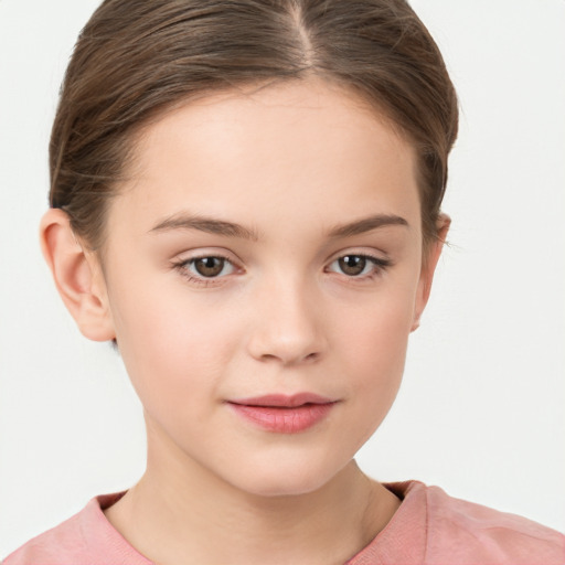 Joyful white child female with short  brown hair and brown eyes