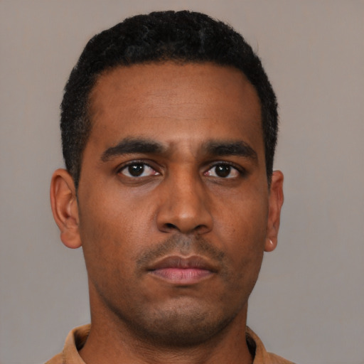 Neutral latino young-adult male with short  brown hair and brown eyes