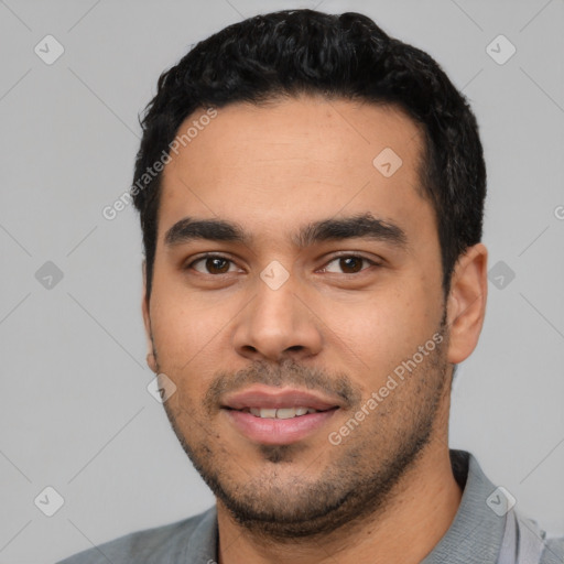 Neutral latino young-adult male with short  black hair and brown eyes