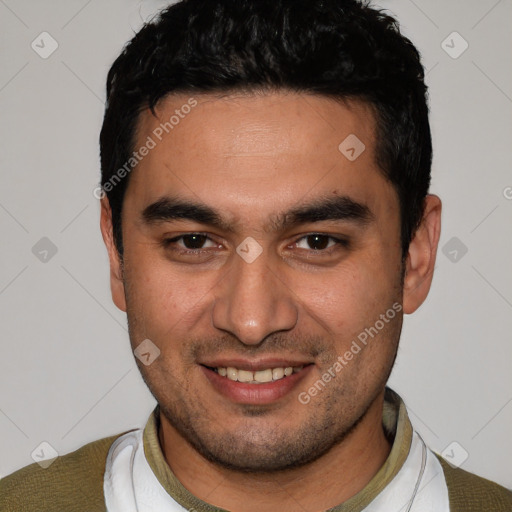 Joyful white young-adult male with short  black hair and brown eyes