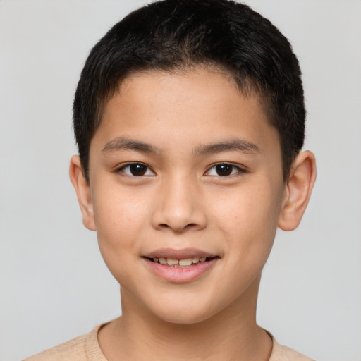 Joyful white child male with short  brown hair and brown eyes