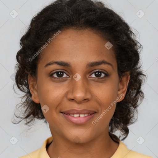 Joyful black young-adult female with medium  brown hair and brown eyes