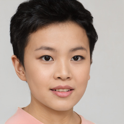 Joyful asian young-adult female with short  black hair and brown eyes