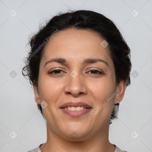 Joyful latino young-adult female with short  brown hair and brown eyes