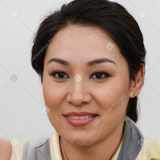 Joyful asian young-adult female with medium  brown hair and brown eyes