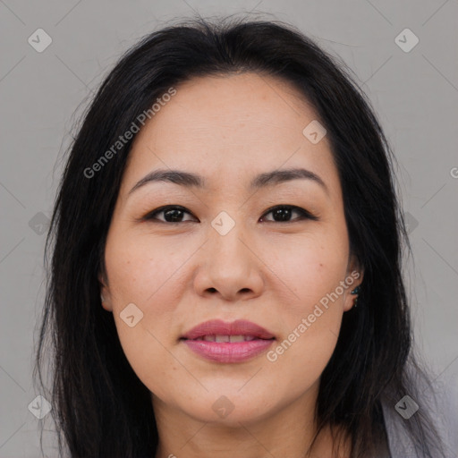 Joyful asian young-adult female with long  brown hair and brown eyes