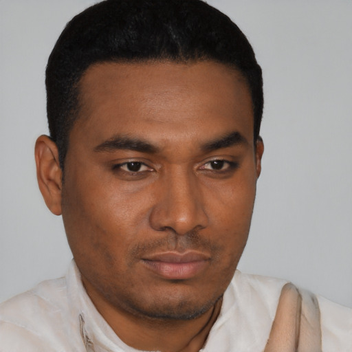 Neutral black young-adult male with short  black hair and brown eyes